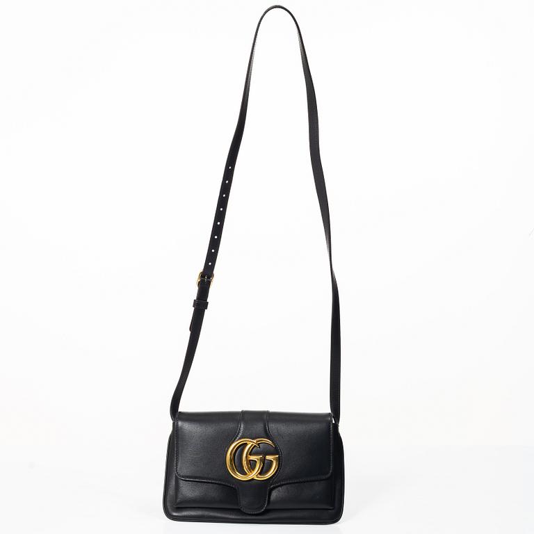 Gucci, a handbag.