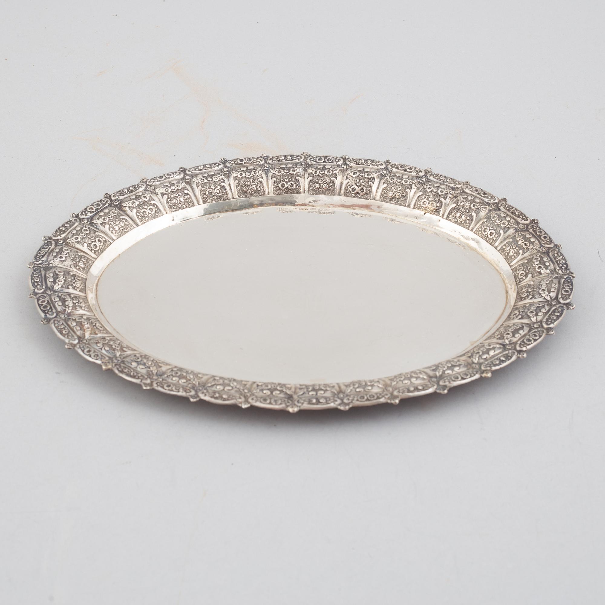 E.Jäntti, four silver cups, a three-piece silver coffee service and a silver tray, Helsinki, Finland,1979-81.