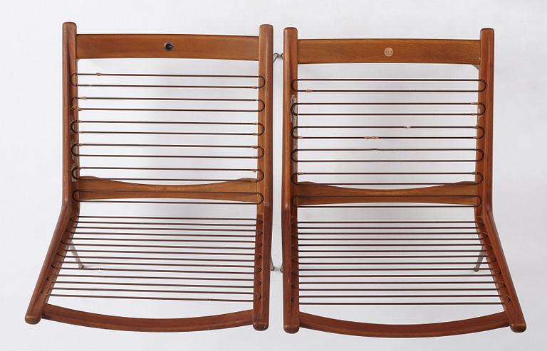 Peter Hvidt & Orla Mølgaard Nielsen, two teak "Boomerang" easy chairs, France & Daverkosen, Denmark 1950's.