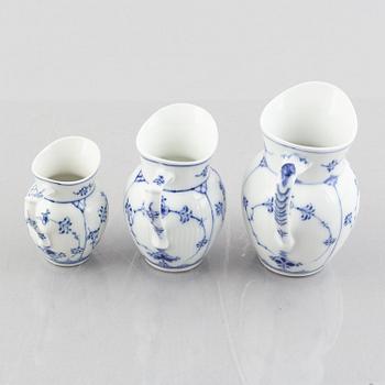 Three 'Blue Fluted Plain' / 'Musselmalet' porcelain jugs, Royal Copenhagen, 20th century.