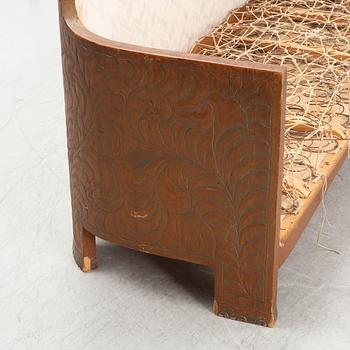 Otto Wretling, attributed to, an Art Nouveau pine sofa, Sweden early 20thC.