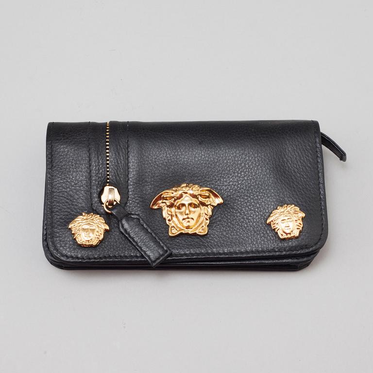 a VERSACE wallet.