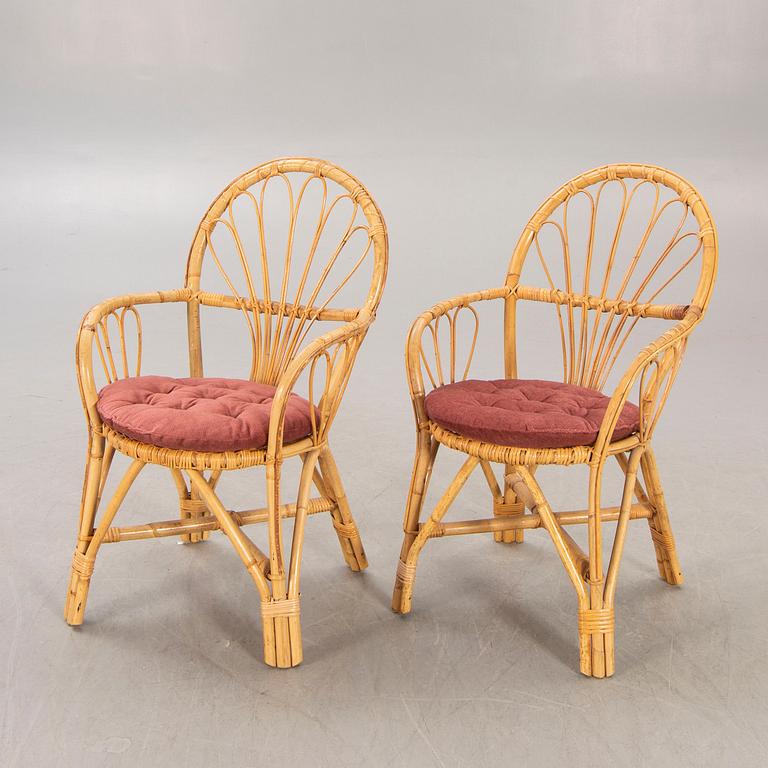 A pair of bamboo and rattan 1960/70s armchairs.