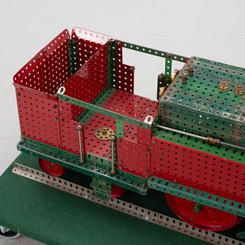Meccano, locomotive and excavator.