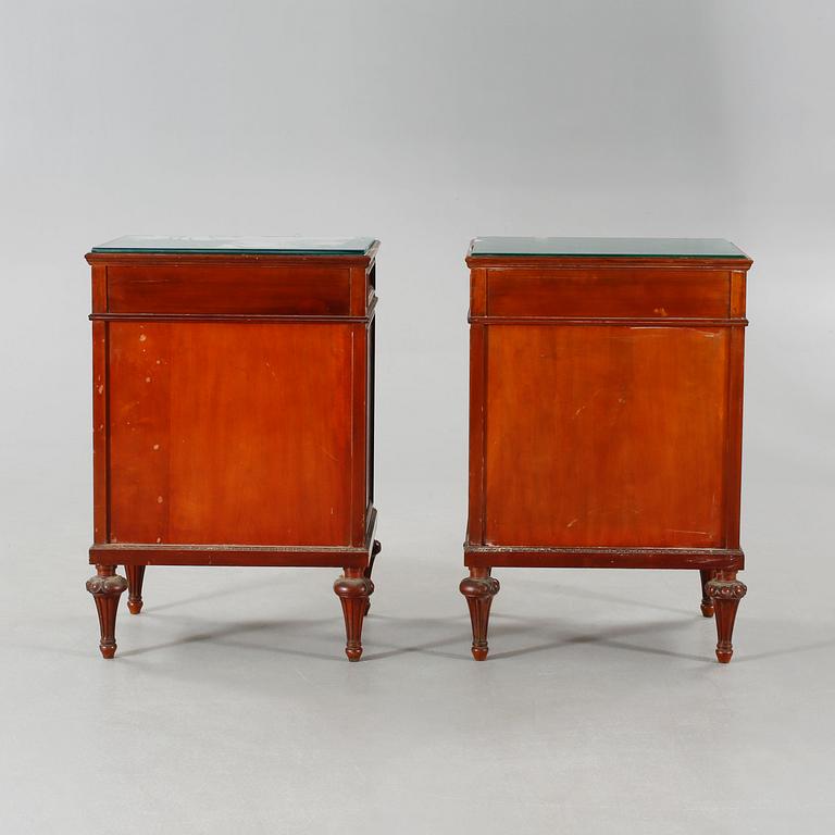 A pair of early 20th century bedside tables.