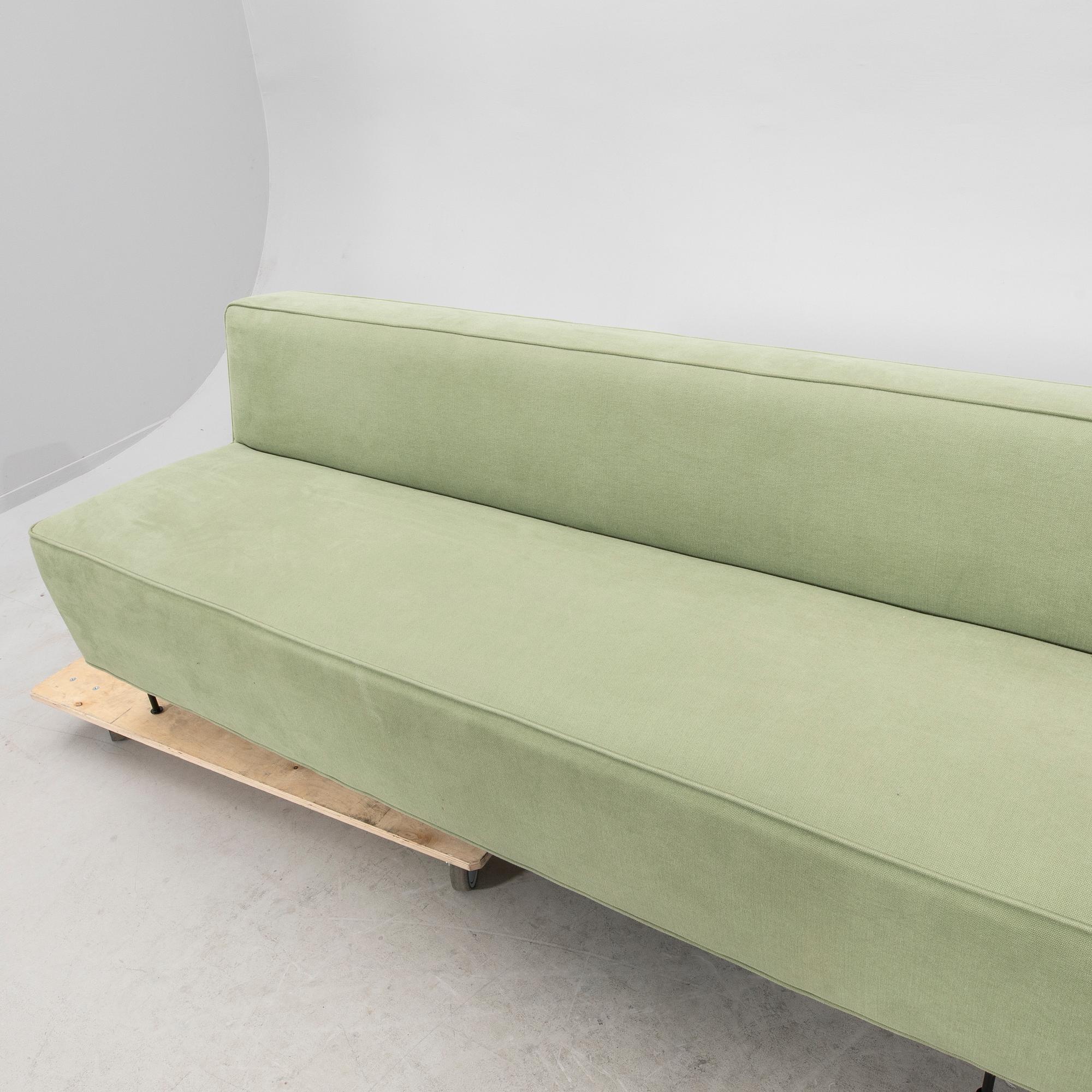 A sofa Modern Line' by Greta Magnusson Grossman, produced by Gubi, contemporary.