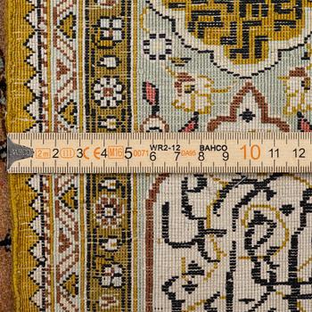 A silk Quum rug, c. 155 x 103 cm.
