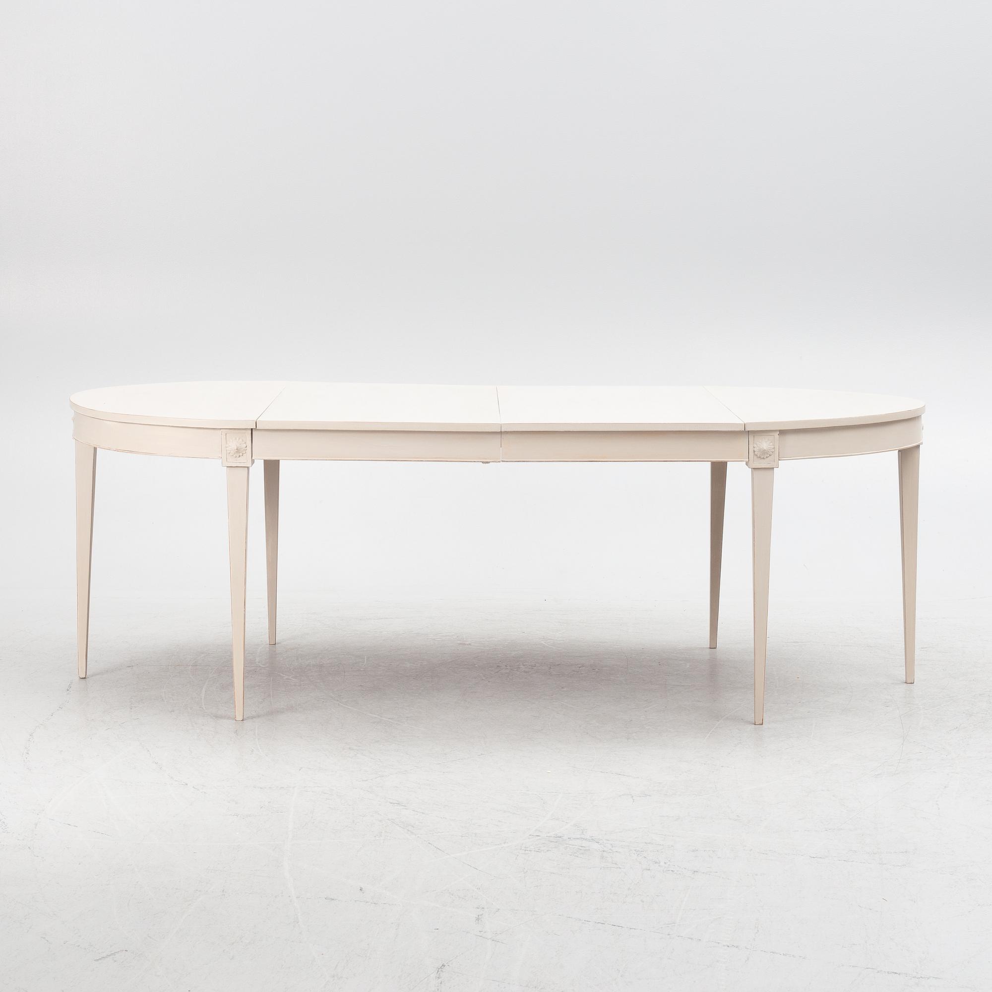 A Gustavian style dining table, mid-20th Century.