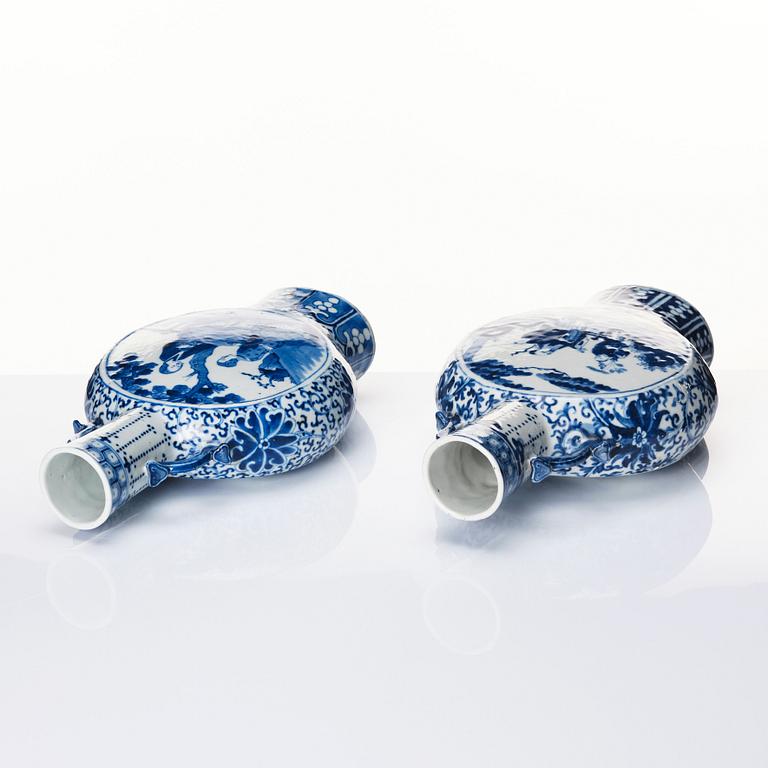 A matched pair of blue and white moon flasks, Qing dynasty, 19th century.