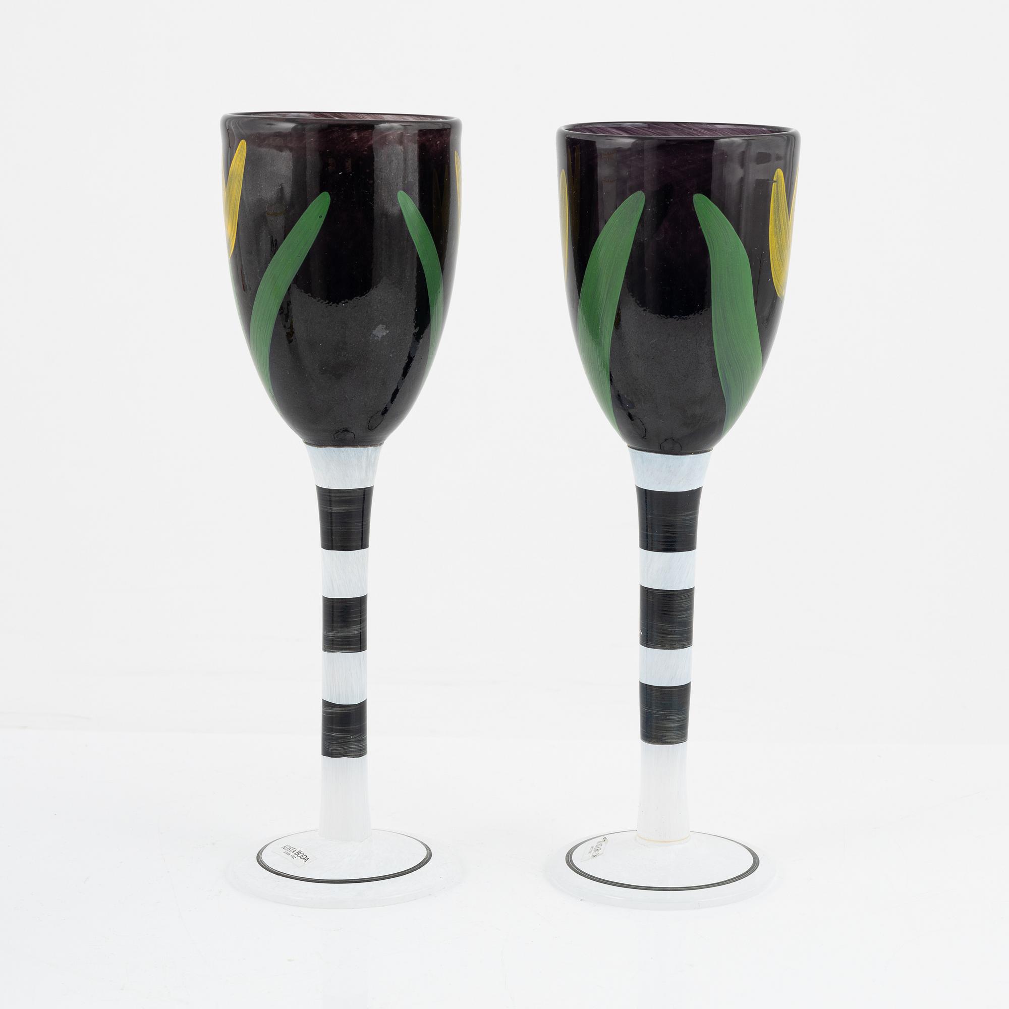Ulrica Hydman-Vallien, a pair of glass goblets and a vase, Kosta Boda.