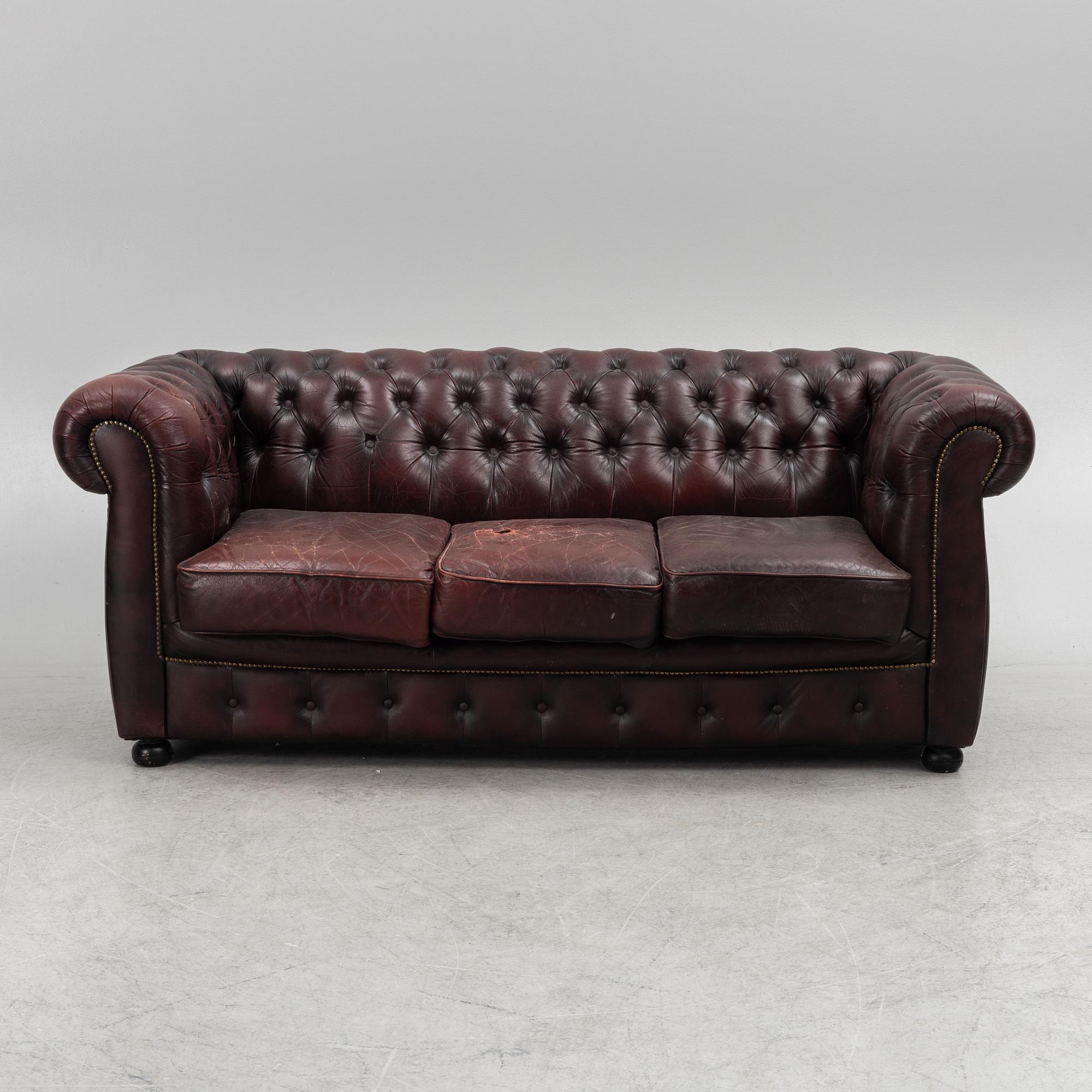 Sofa and armchair, Chesterfield, second half of the 20th Century.