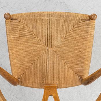 Hans J Wegner, a model 'CH 24' beech chair, Carl Hansen & Son, Odense, Denmark.