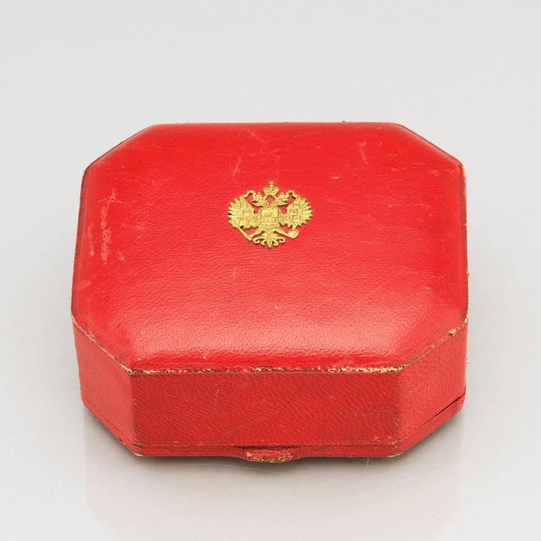 An Imperial Presentation jewelled gold and enamel box, Alexander Treiden for Hahn, St Petersburg before 1899.