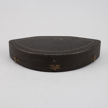A set of six German parcel-gilt silver 800 salt cellars in fitted case.