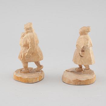 Two wooden figures by Åke Sundqvist from the second half of the 20th century.