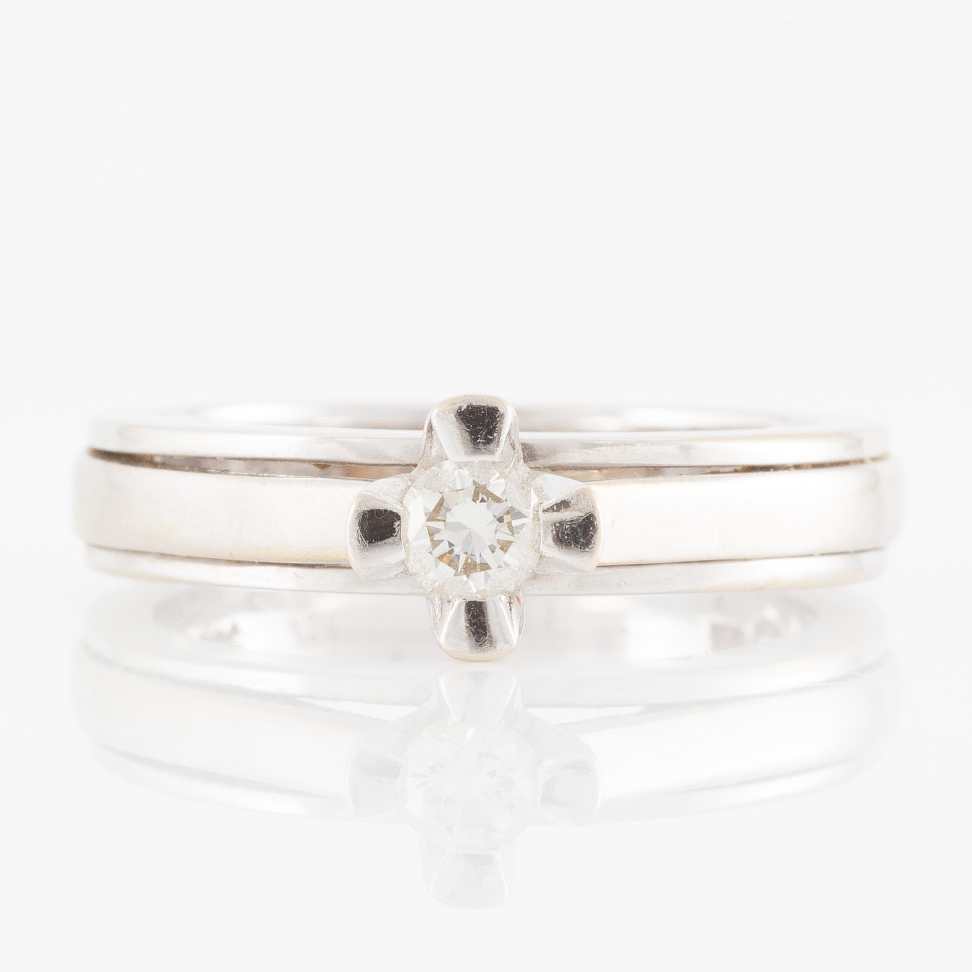 Ring in 18K white gold set with a brilliant-cut diamond, approximately 0.21 ct.