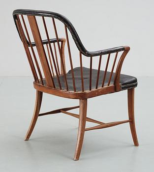 A mahogany and black leather armchair attributed to Josef Frank, either Haus & Garten, Austria or Svenskt Tenn,