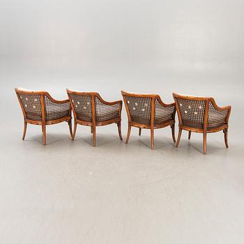 A set of four imitated bamboo and rattan easy chairs later part of the 20th century.