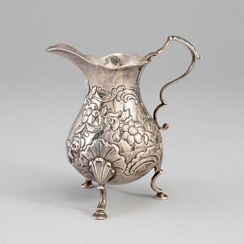 An English mid 18th century silver cream-jug, mark of David Hennell I, London 1754.