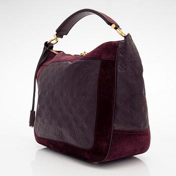 Louis Vuitton, a Monogram Empreinte 'Audacieuse' bag.
