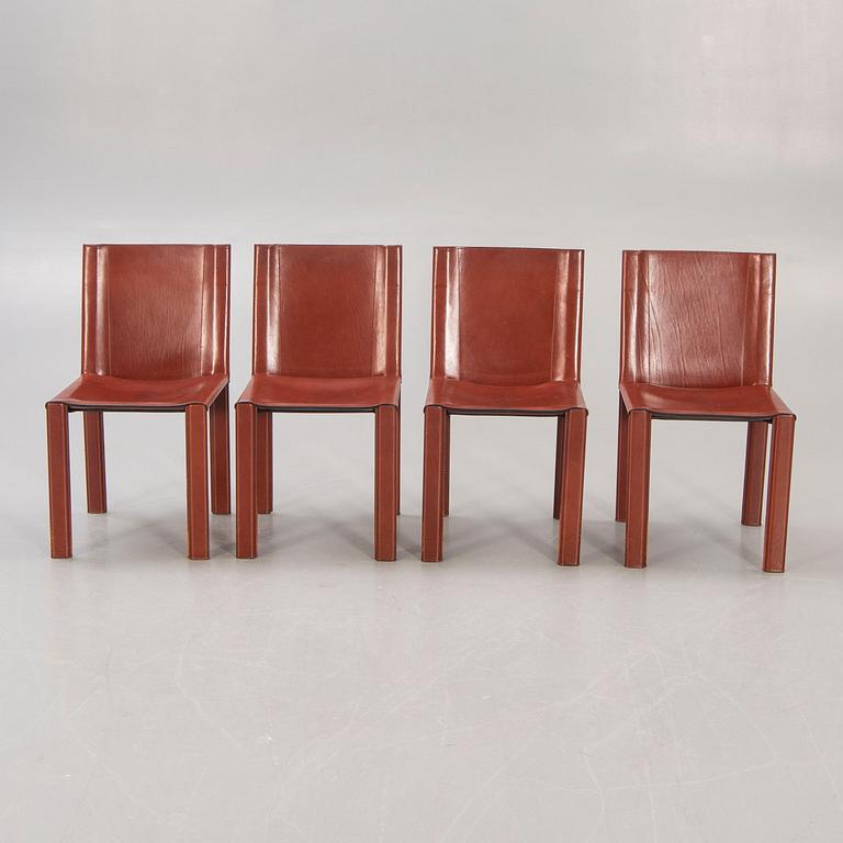 A set of four Matteo Grassi leather chairs alter part of the 20th century.