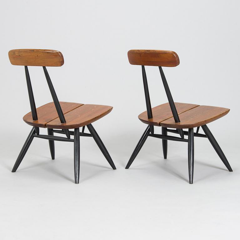 Ilmari Tapiovaara, a pair of 1960's 'Pirkka lounge chairs' by Laukaan Puu, Finland.