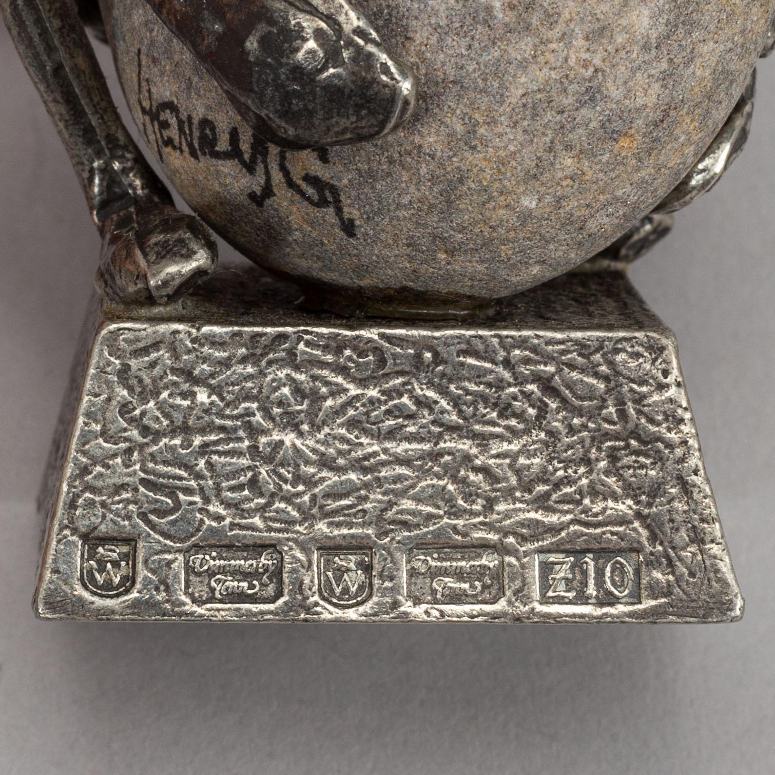 HENRY GUSTAFSSON, skulptur, "Lyftet", tenn och sten, Vimmerby, signerad, 1998.