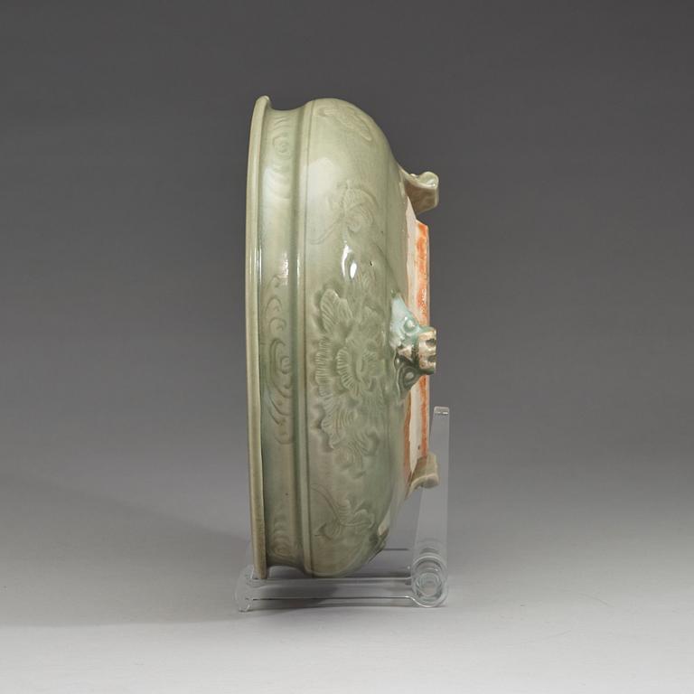 A large tripod celadon censer, presumably late Ming dynasty (1368-1644).
