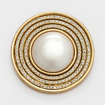 Balenciaga, a brooch.