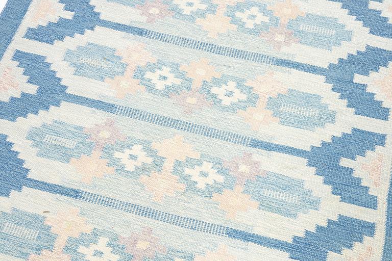 Ingegerd Silow, a flat weave rug, signed IS, c. 195 x 140 cm.