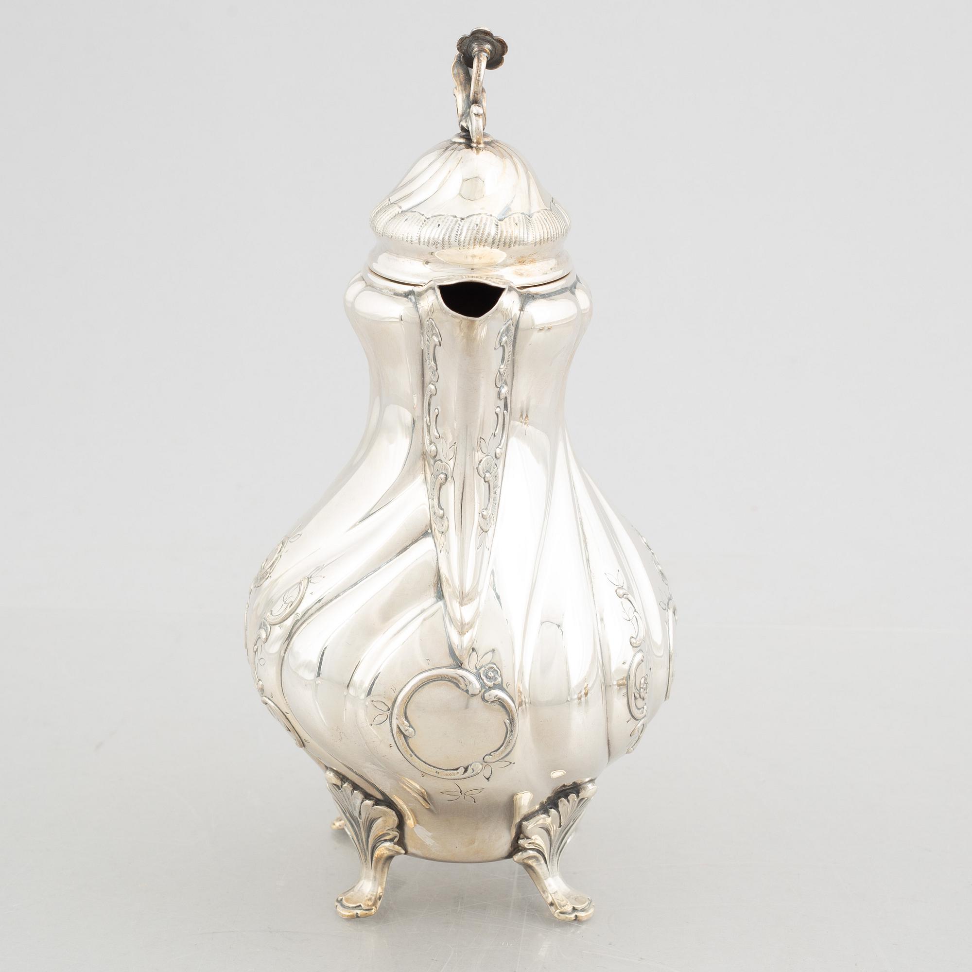 A 3-piece Rococo style silver coffee service, mark of GAB, Stockholm 1951-1954.