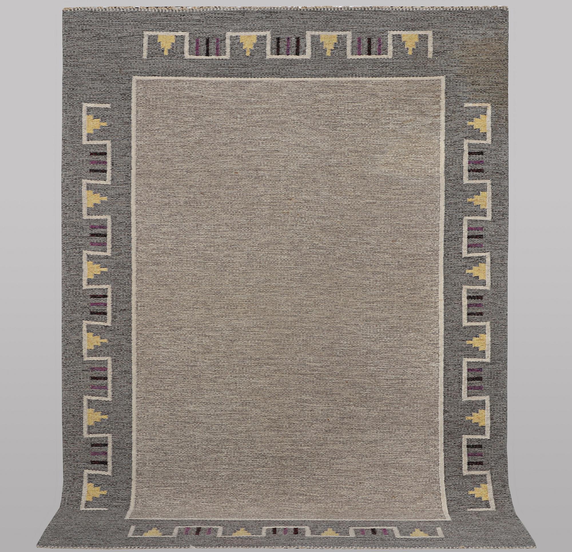 A carpet, flat weave, ca 240 x 165 cm.