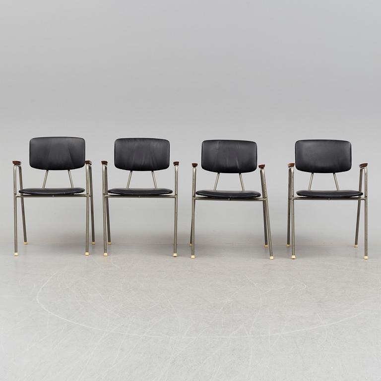 Four tubular steel armchairs, 1950's.