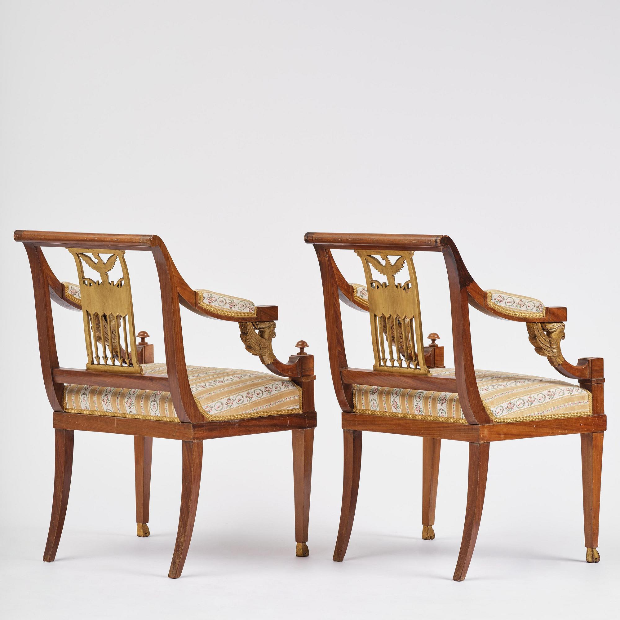 A pair of presumably Baltic empire mahogny armchairs.