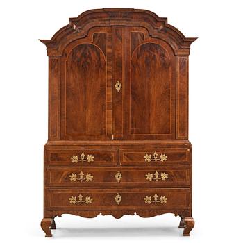 A rococo walnut parquetry cabinet, Stockholm, later part of the 18th century.