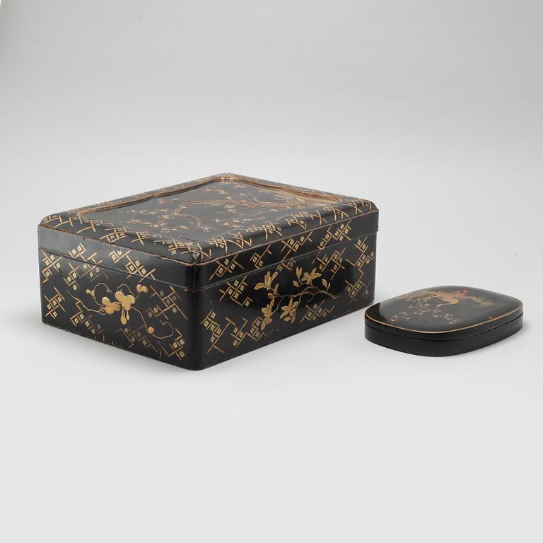 Two Japanese lacquered boxes with covers, circa 1900.