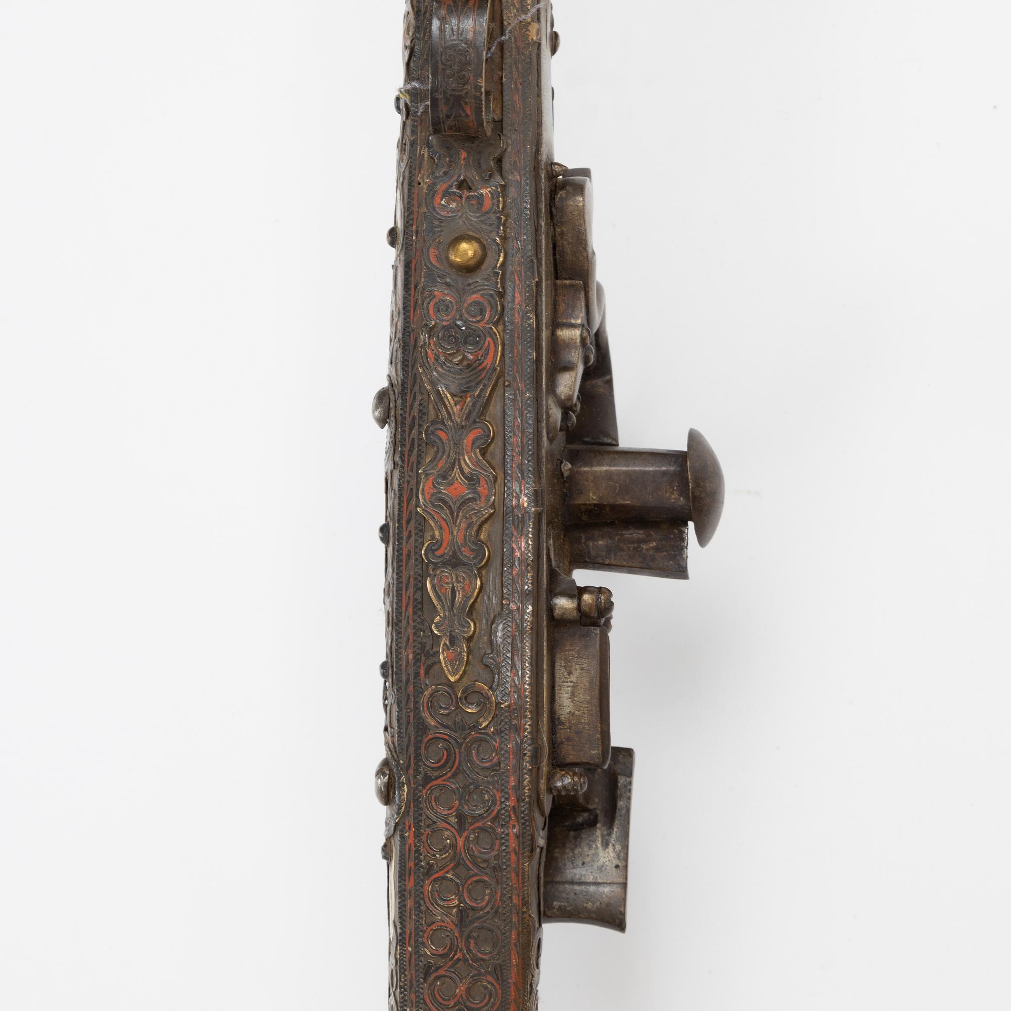 A snaphaunce gun, 19th Century.
