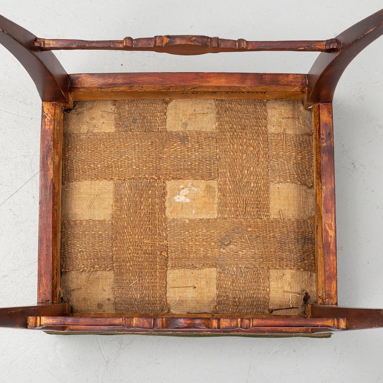 A pair of Swedish Empire stools, early 19th century.