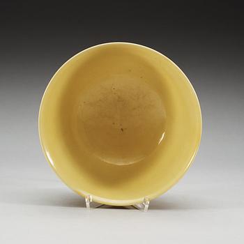 A yellow glazed bowl, Ming dynasty, with Jiajings six character mark and of the period (1522-66).