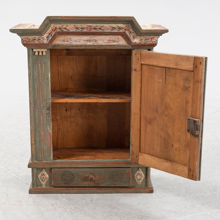A painted 19th Century wall cabinet.