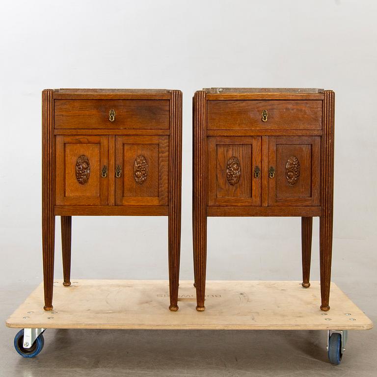 A pair of oak bedside tables beginning of the 20th century.