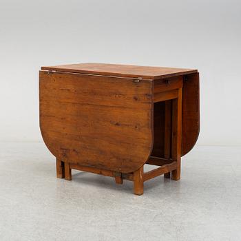 A 19th century gate-leg table.