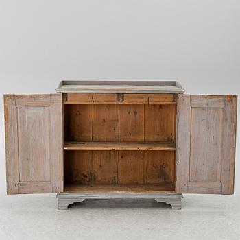 A Gustavian cupboard, circa 1800.