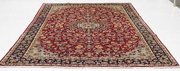 A Tabriz carpet, c. 333 x 216 cm.