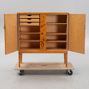 A birch wood veneered cabinet, first half of the 20th Century.