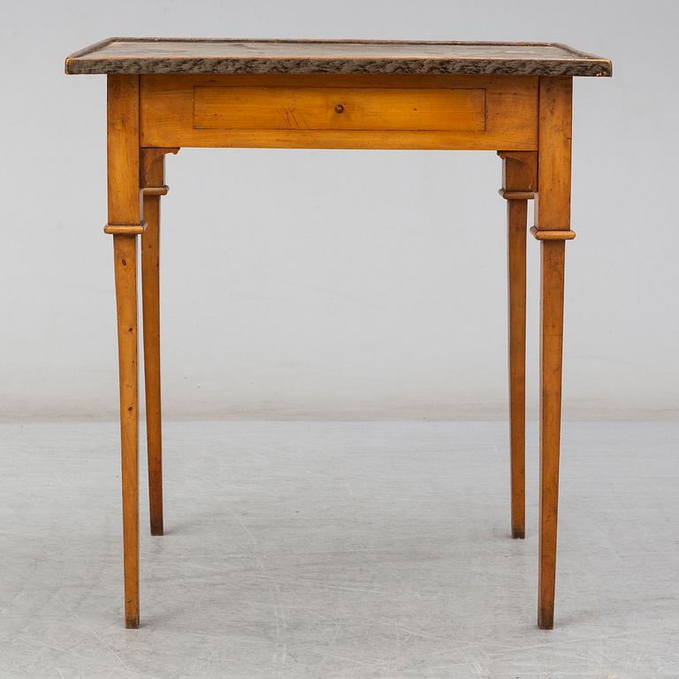 A Swedish late gustavian table. First half of the 19th century.