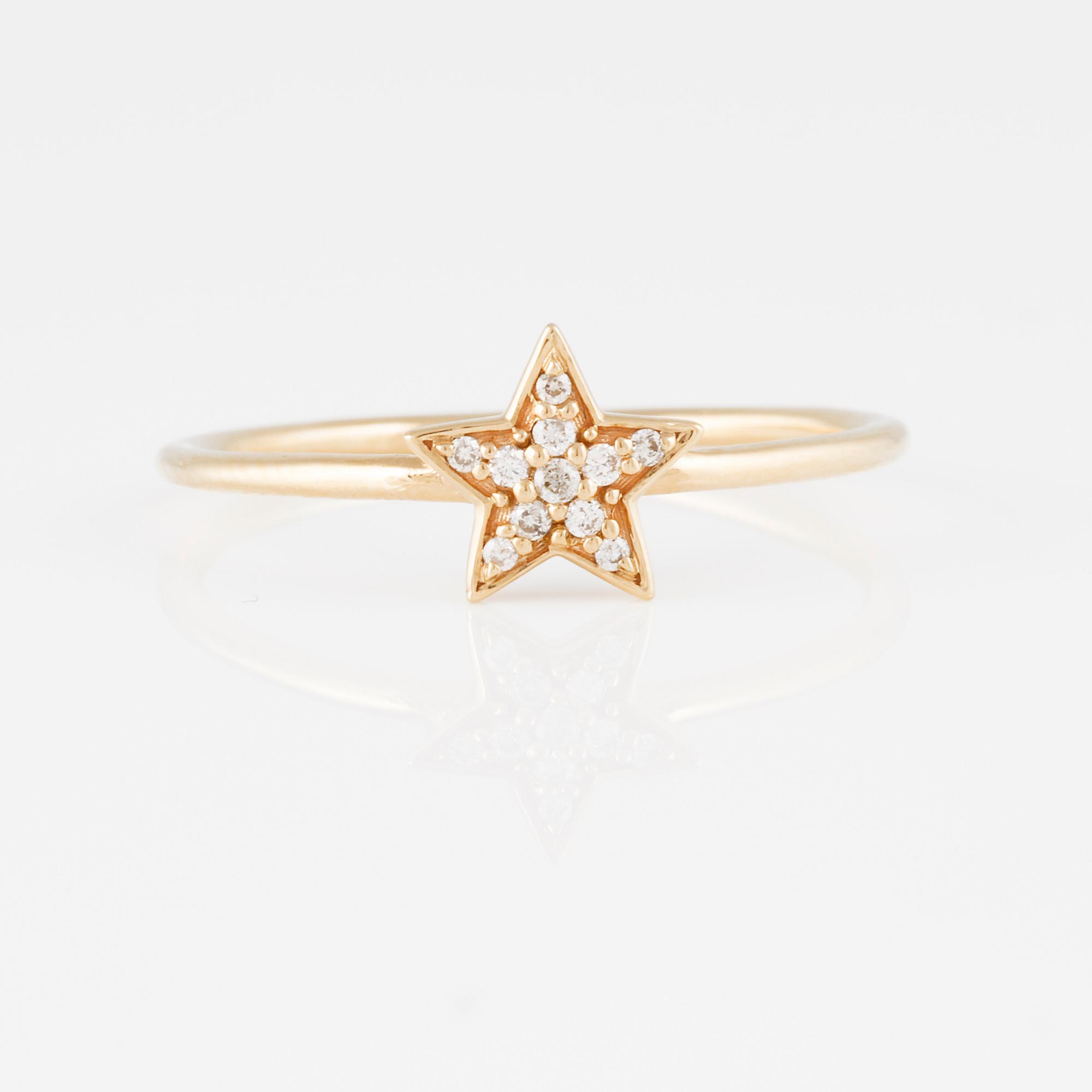 RING, 18K guld med briljantslipade diamanter ca 0.05 ct. Vikt 1,3 gram.