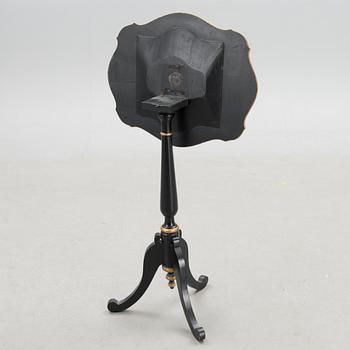 A Chinese tilt top chess table from the first half of the 20th century.