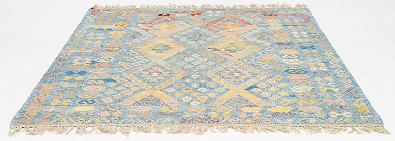 A Kilim rug, c. 255 x 202 cm.