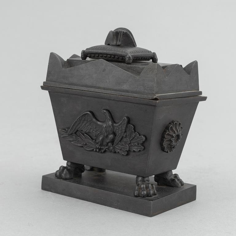 A cast iron inkwell in the form of the sarcophagus of Napoleon, Königliche Preußische Eisengießerei, Berlin, ca. 1815-20.